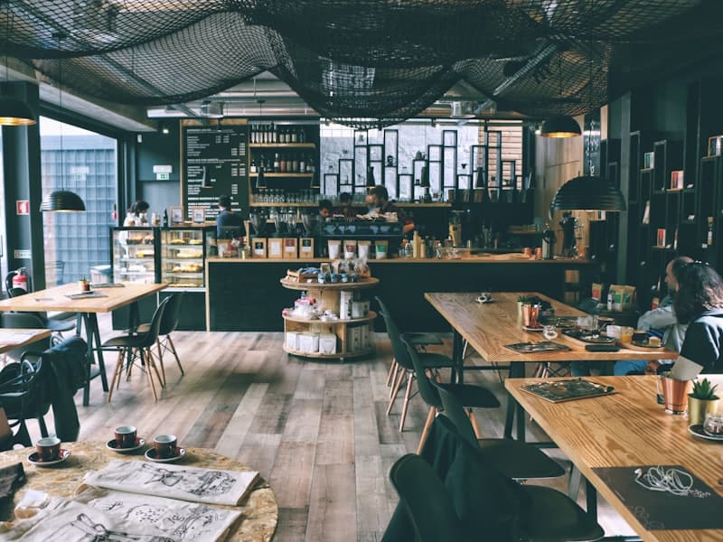 Coffee shop interior with service counter and branded seating
