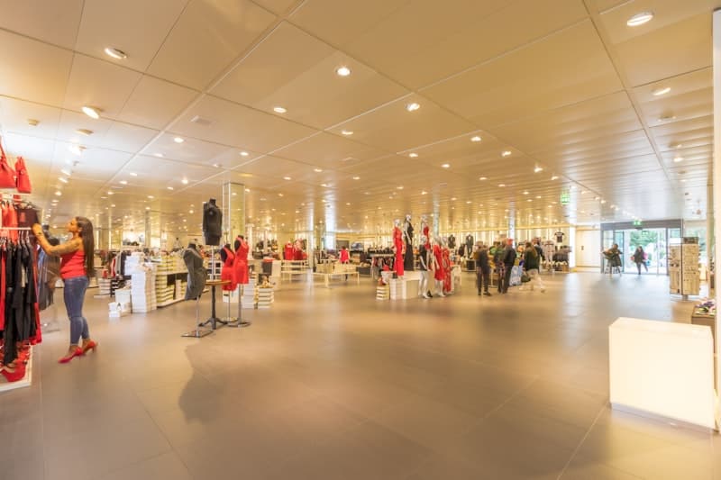 Modern retail store interior with display shelving and branded fixtures